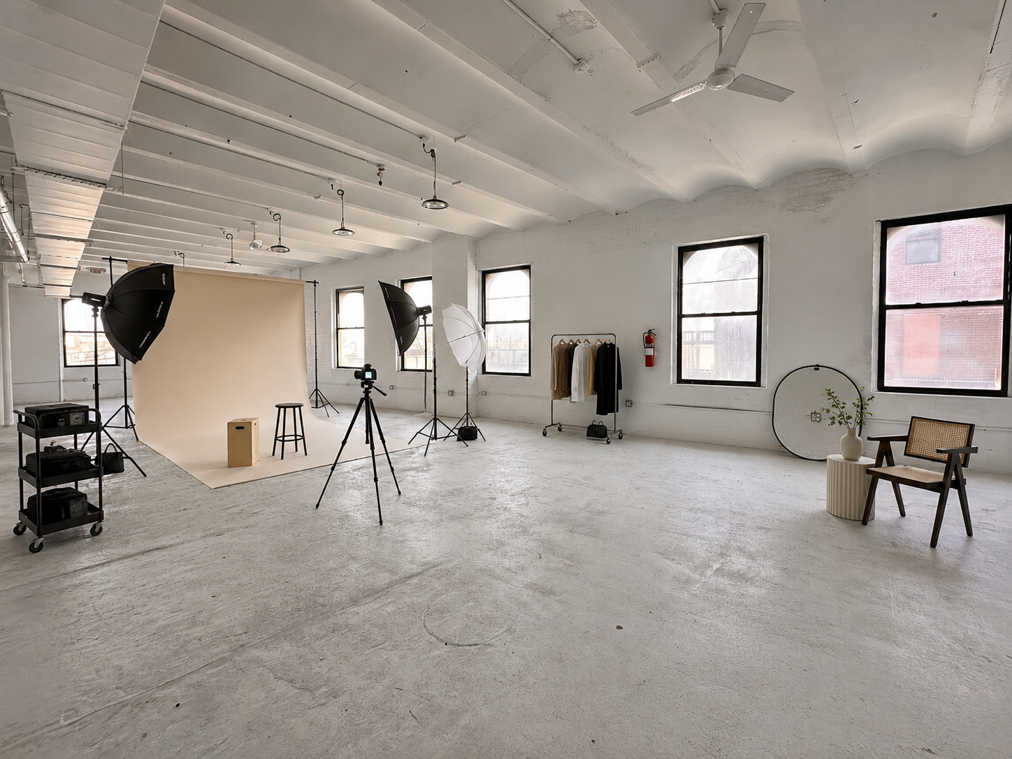 Lighting and set built across the open studio floor